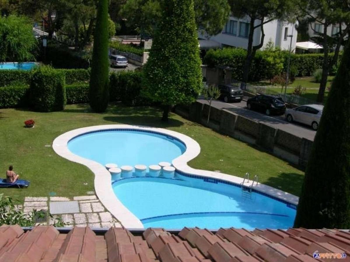 Appartamento Genziana - Con Vista Piscina E Garage Sirmione Dış mekan fotoğraf