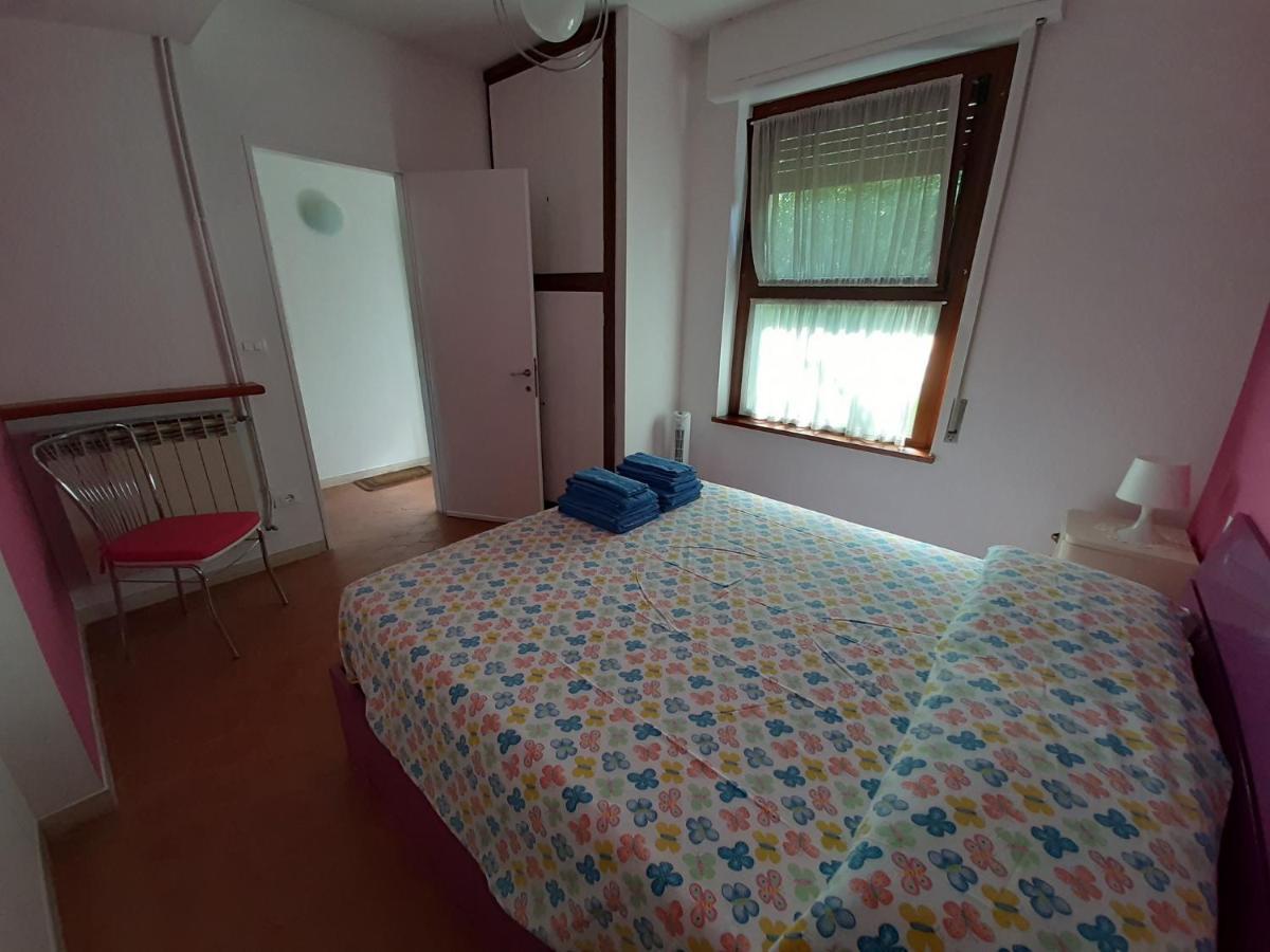 Appartamento Genziana - Con Vista Piscina E Garage Sirmione Dış mekan fotoğraf